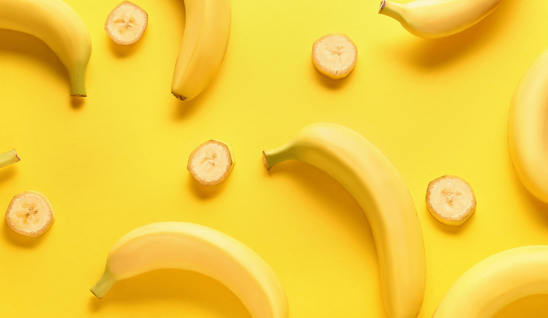 Bananas on yellow background.