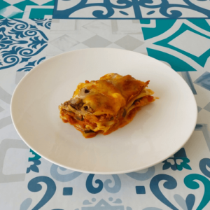 Slice of veggie and mushroom lasagne.